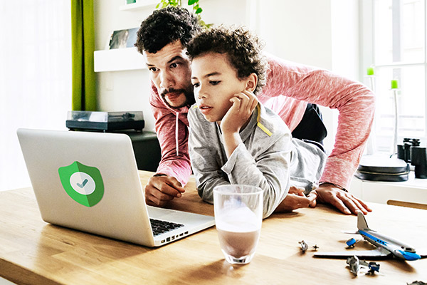 father and son on computer